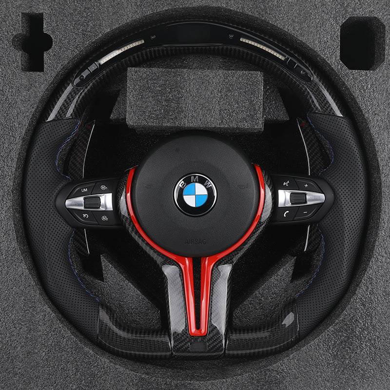 Volante BMW M Performance en Fibra de Carbono, Alcantara Perforada, Levas Rojas y Botones M1/M2