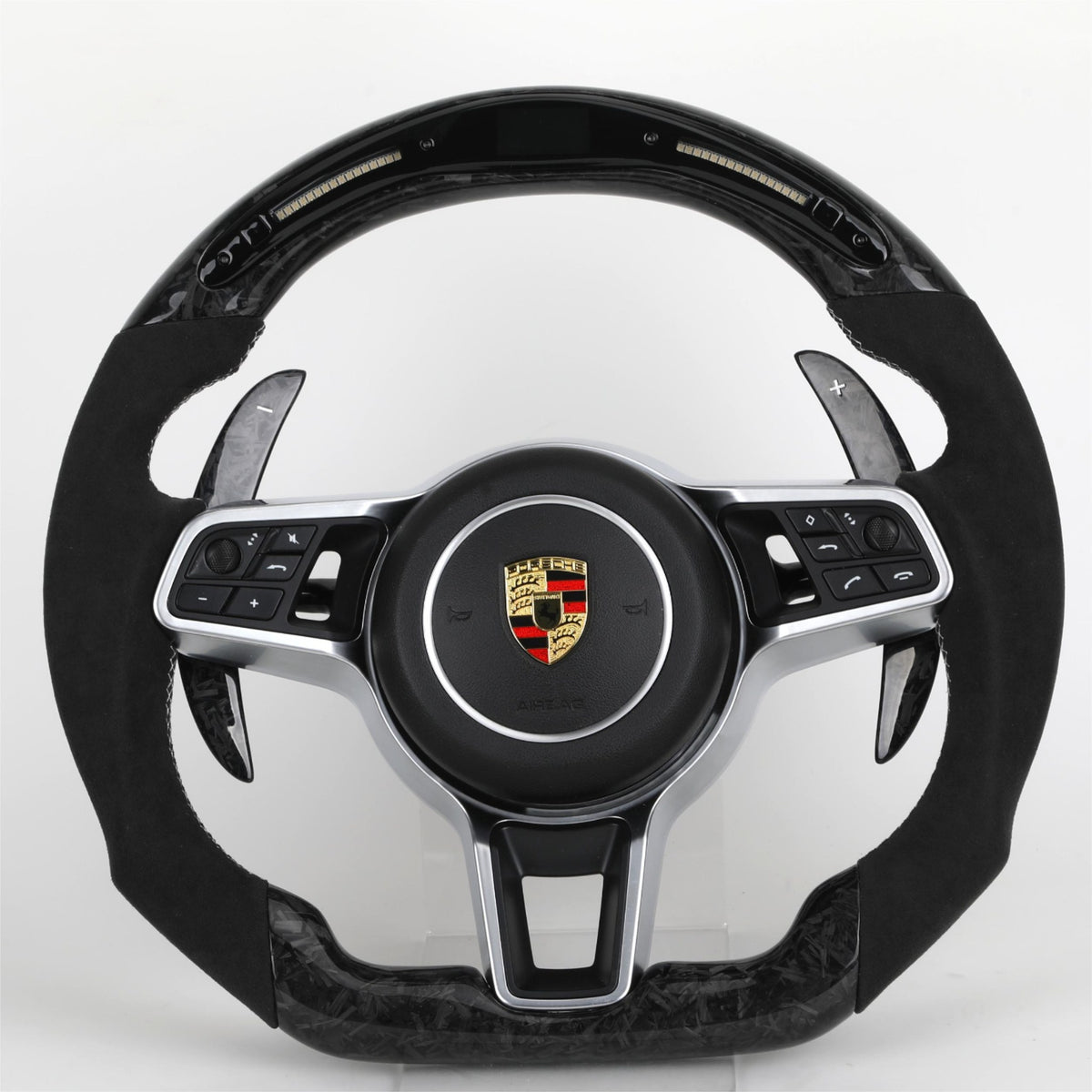 Volante Porsche deportivo en fibra de carbono forjada, Alcántara y pantalla LED con airbag incluido