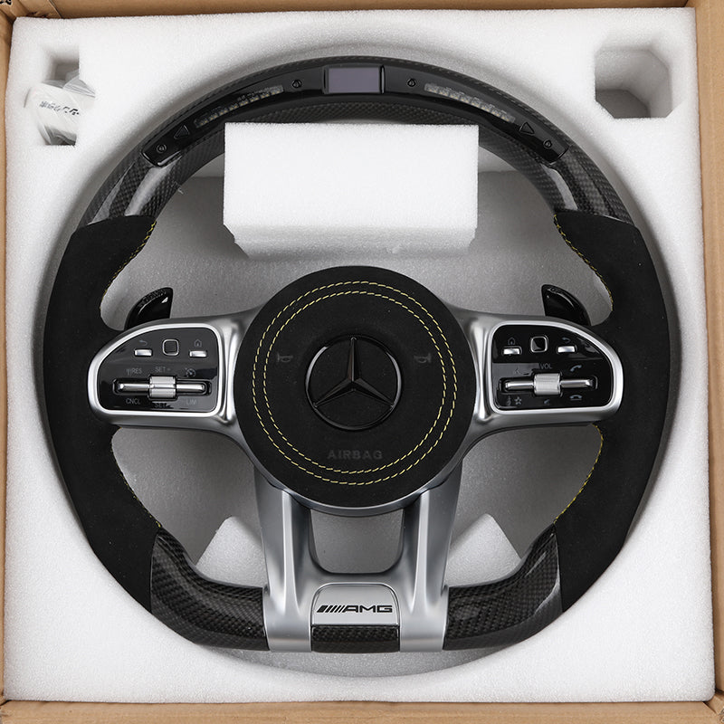Volante Mercedes-AMG Performance en Fibra de Carbono y Microfibra con Levas, Pantalla LED y Multifunción