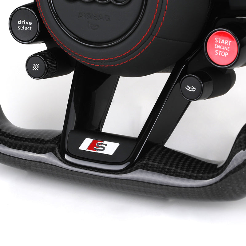 Volante Audi S deportivo en fibra de carbono, cuero perforado y costuras rojas con airbag incluido