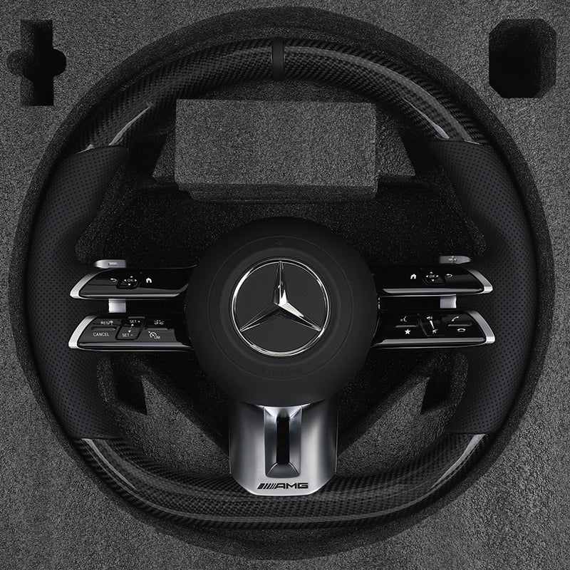 Volante Mercedes-AMG de Fibra de Carbono y Cuero Perforado con Airbag Incluido
