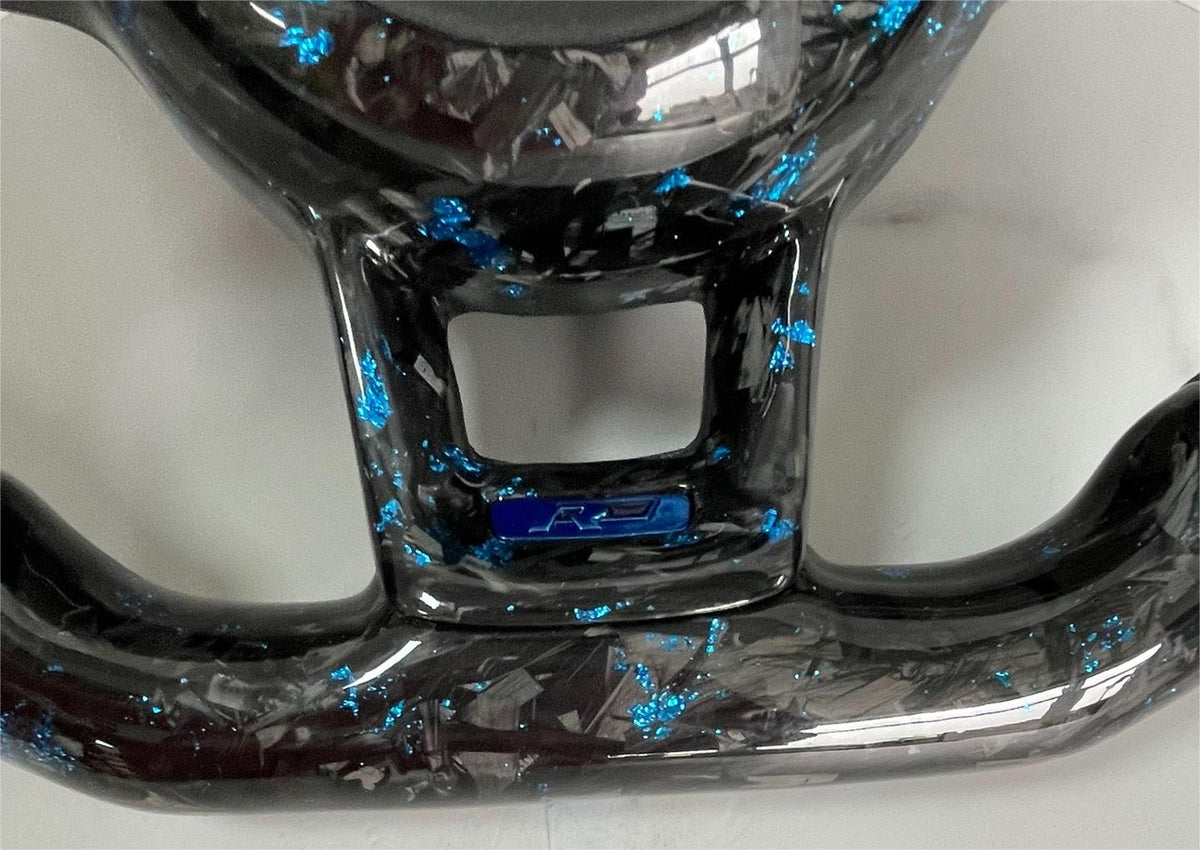 Volante Volkswagen R Deportivo en Fibra de Carbono Forjado con Detalles Azules y Cuero Perforado | Display LED, Levas, Multifunción y Airbag