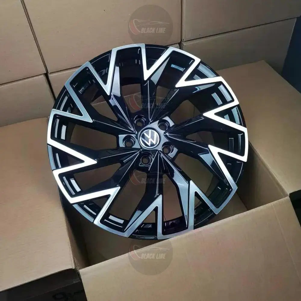 Llantas Deportivas Estilo Volkswagen con Diseño Turbina Angular – Negro y Plata