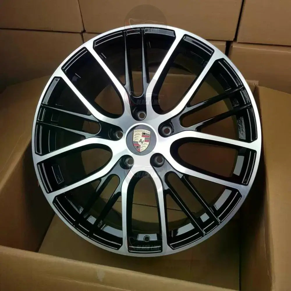 Llantas Porsche Deportivas Multirradio en Negro Brillo y Plata Mecanizada | Diseño Bicolor con Emblema Central