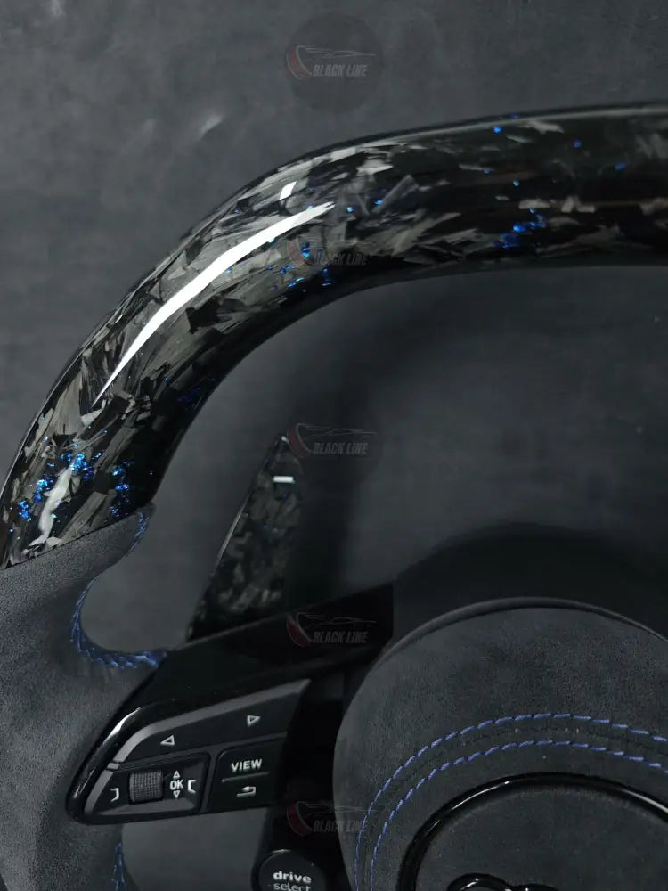 Volante Audi RS en Alcantara Negra con Fibra de Carbono Azul Levas y Multifunción