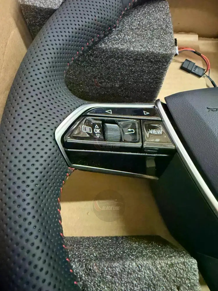 Volante Audi RS en Cuero Negro Perforado con Levas Multifunción y Detalles RS