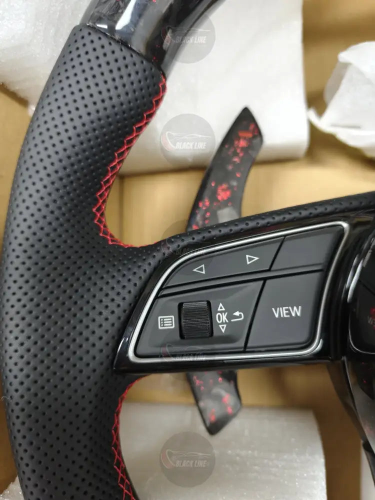 Volante Audi RS Performance en Fibra de Carbono Cuero Perforado Levas y Multifunción con Detalles Rojos
