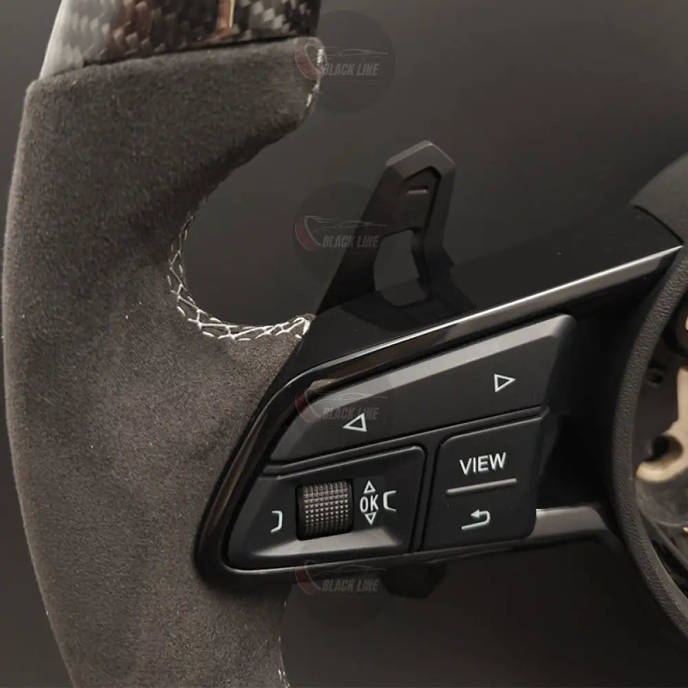 Volante Audi RS Performance en Fibra de Carbono y Alcantara con Levas Multifunción y Costuras Blancas