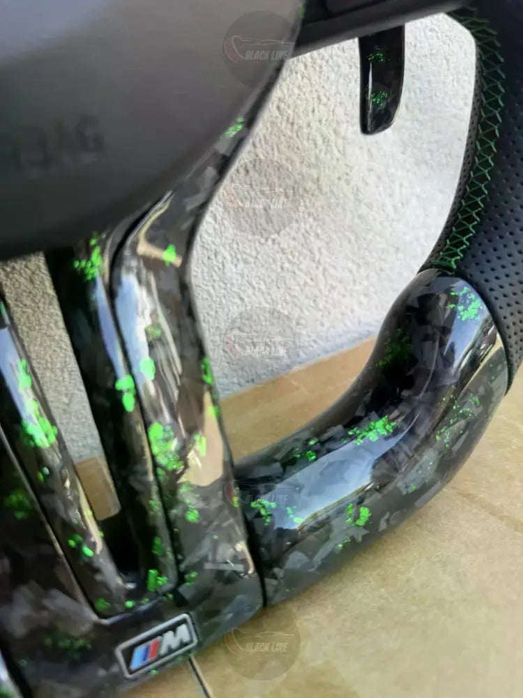 Volante BMW M Personalizado en Carbono Negro con Detalles Verdes Levas M1/M2 y Multifunción
