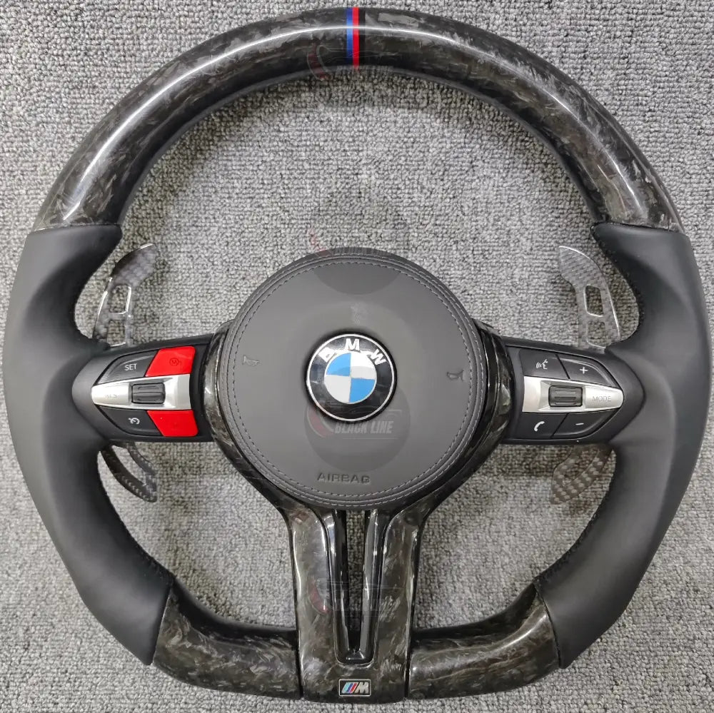 Volante BMW M Deportivo en Carbono Forjado y Piel Negra | Botones M1/M2 Levas de Carbono Fondo Plano y Airbag
