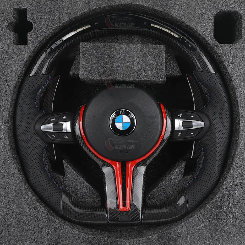 Volante BMW M Performance en Fibra de Carbono Alcantara Perforada Levas Rojas y Botones M1/M2