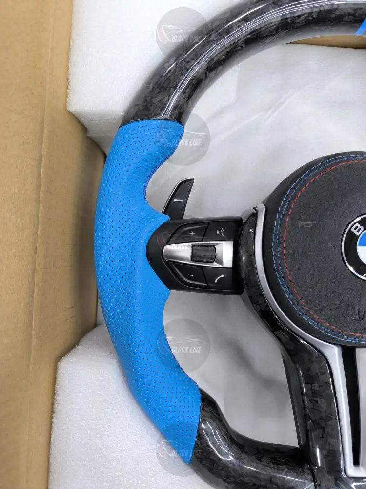 Volante BMW M Performance Deportivo en Carbono Forjado y Piel Azul | Levas de Cambio Fondo Plano Mandos Multifunción y