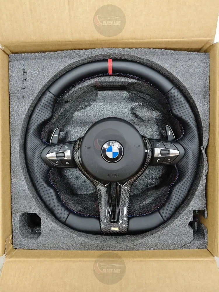 Volante BMW M Performance en Cuero Negro Perforado y Fibra de Carbono con Levas M1/M2 y Marcador Rojo