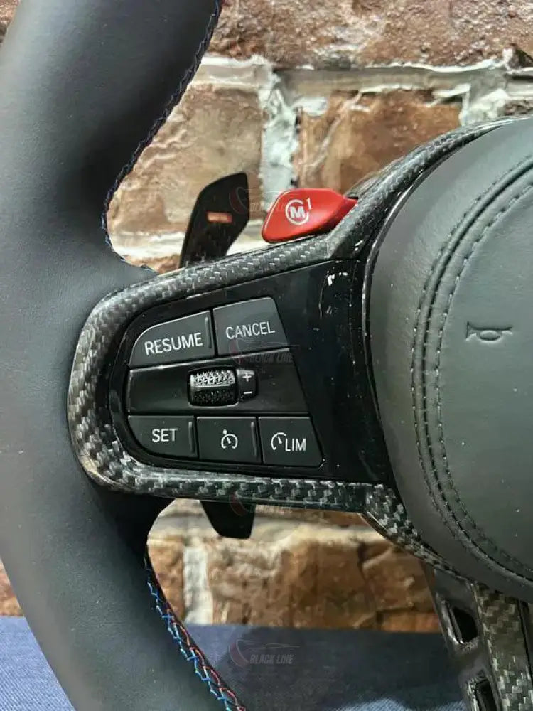 Volante BMW M Performance en Cuero Negro y Fibra de Carbono con Botones M1/M2 Levas y Multifunción