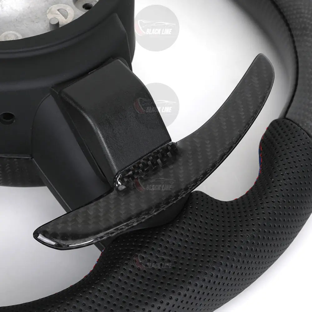 Volante BMW M Performance en Fibra de Carbono y Alcantara con Race Display Levas y Botones M1/M2