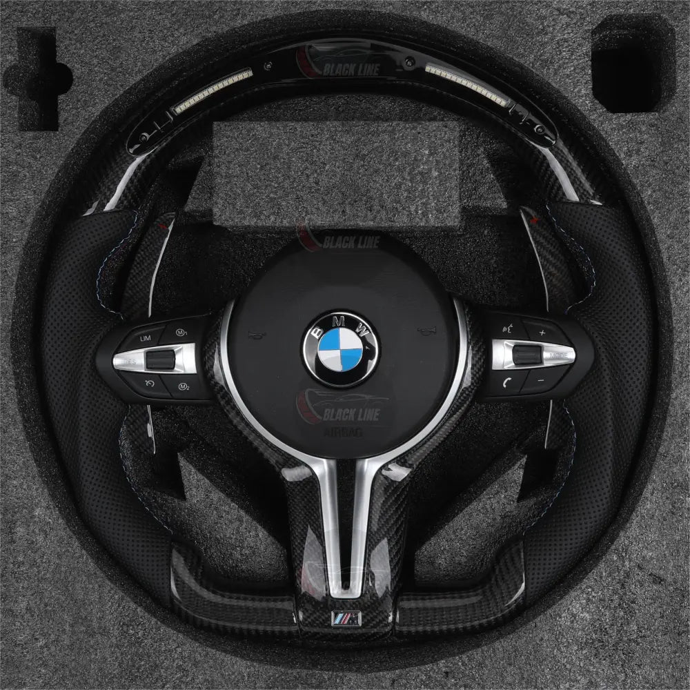 Volante BMW M Performance en Fibra de Carbono y Alcantara con Race Display Levas y Botones M1/M2