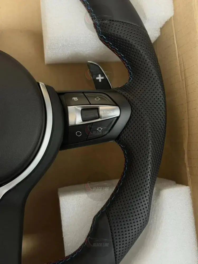 Volante BMW M Sport en Cuero Perforado con Levas Multifunción y Costuras M