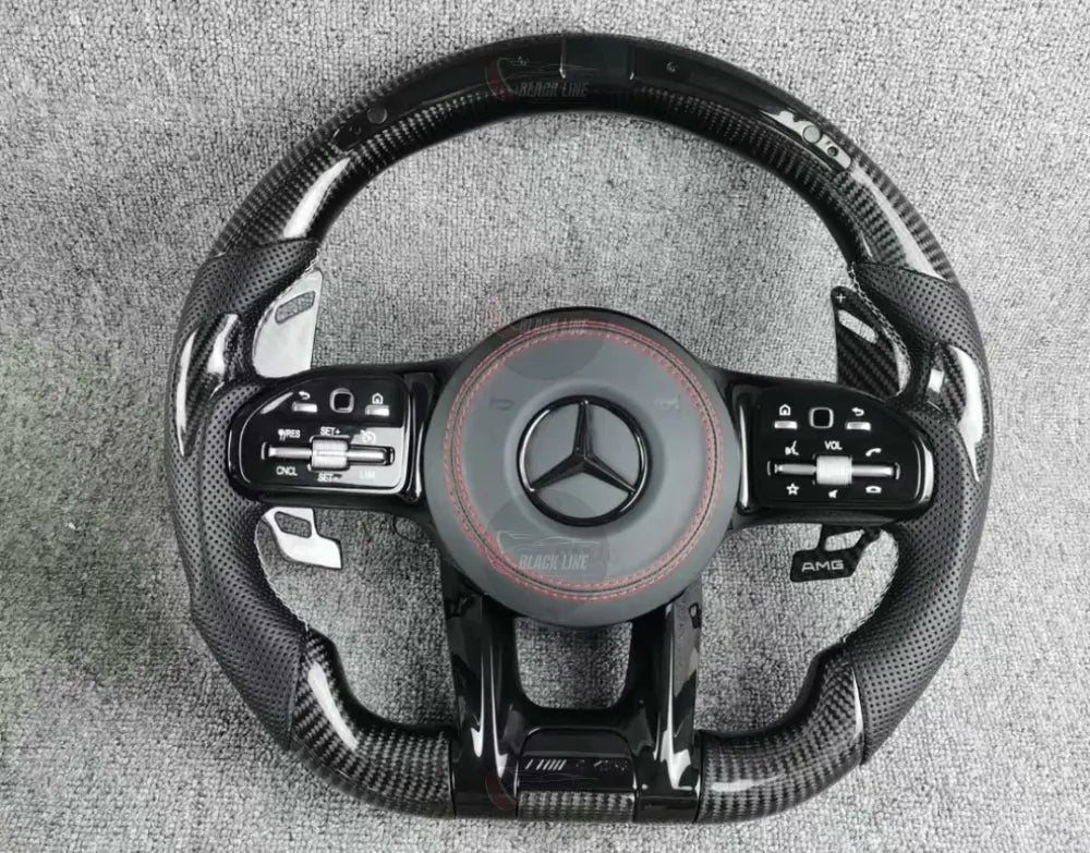 Volante Deportivo Mercedes-AMG de Carbono y Cuero Perforado con LED Levas y Airbag Incluido