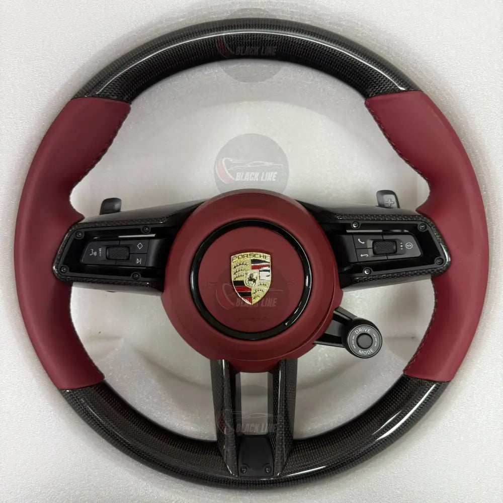 Volante Deportivo Porsche en Fibra de Carbono y Piel Roja con Levas y Controles Multifunción