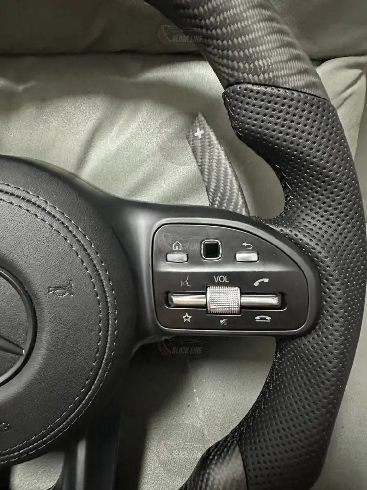 Volante Mercedes-AMG Performance en Acabado Carbono Cuero Perforado Levas y Multifunción