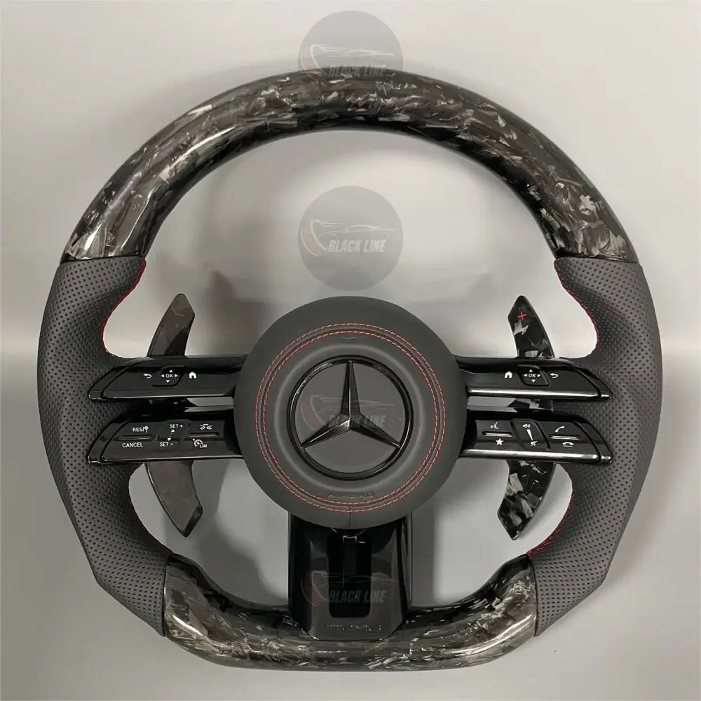 Volante Mercedes-AMG Performance en Carbono Forjado y Cuero Perforado | Cuatro Levas Multifunción Airbag y Costuras