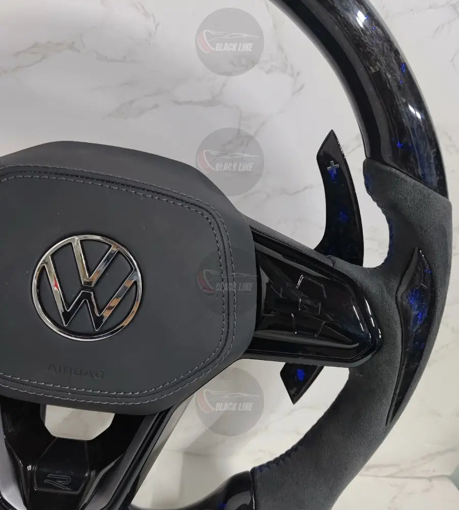 Volante Volkswagen R Deportivo en Carbono Forjado con Detalles Azules y Alcántara Gris | Levas de Carbono Mandos