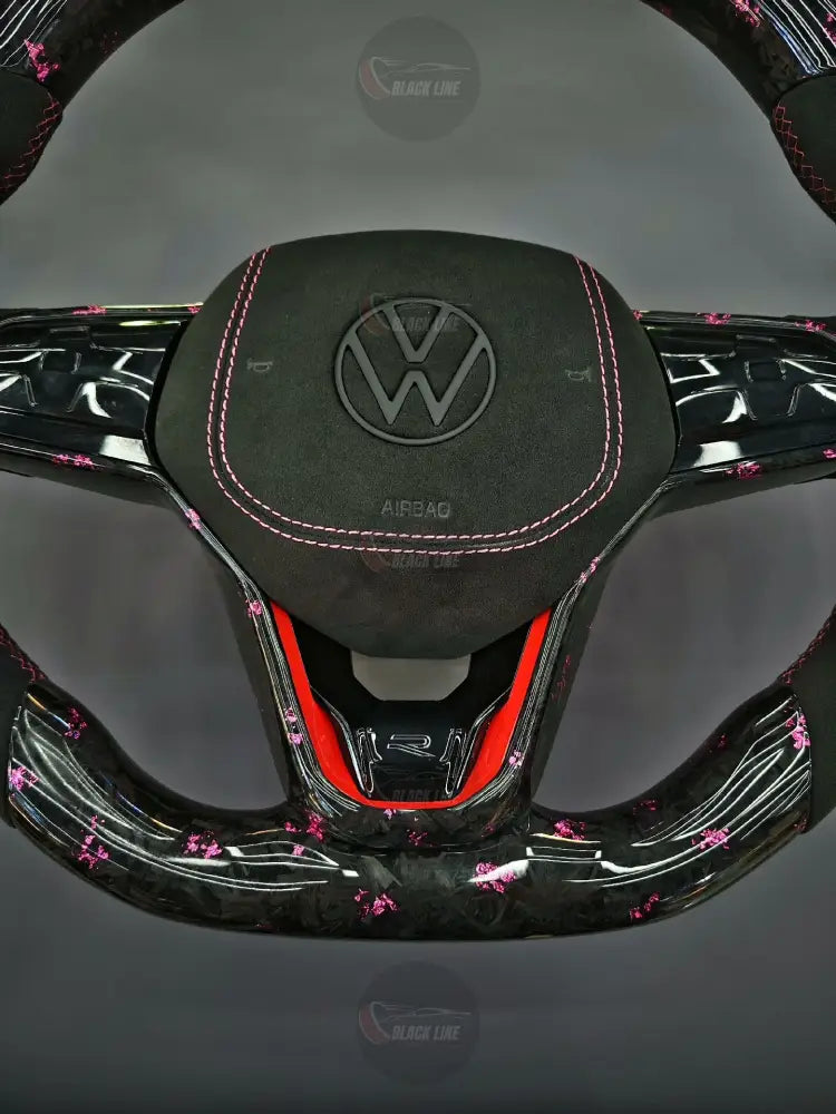 Volante Volkswagen R Deportivo en Carbono Forjado con Detalles Rosas y Alcántara Negra | Mandos Táctiles Fondo Plano y