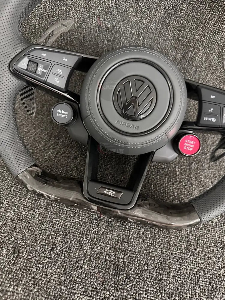 Volante Volkswagen R Deportivo en Carbono Forjado y Piel Perforada | Levas de Carbono Drive Select Botón Start Fondo